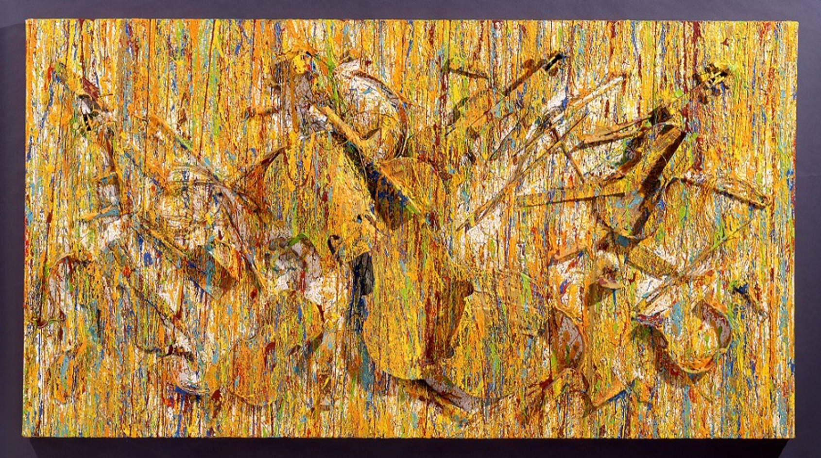 Quatuor d’Automne, Arman, 1991, 124 x 230 x 15 cm. Broken violins and cello with bow and acrylic paint on canvas. Colors: yellow, orange, blue, green, ochre. Courtesy of The Arman Marital Trust. 